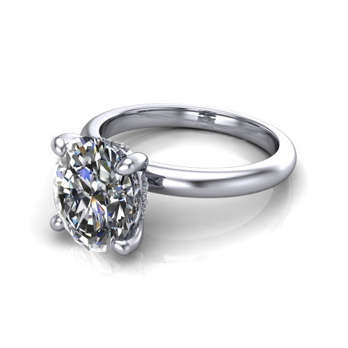 Ariel oval classic engagement ring in 14K White Gold, three-quarter perspective showing the solitaire center diamond raised in four prongs above a slim polished band