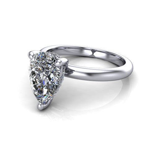 Ariel pear classic engagement ring in 14K White Gold, three-quarter perspective showing the solitaire center diamond raised in four prongs above a slim polished band