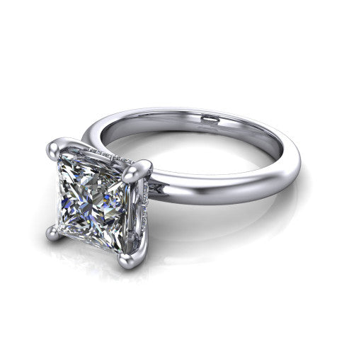 Ariel princess classic engagement ring in 14K White Gold, three-quarter perspective showing the solitaire center diamond raised in four prongs above a slim polished band