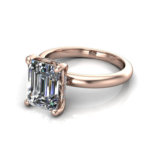 Ariel emerald classic engagement ring in 18K Rose Gold, three-quarter perspective showing the solitaire center diamond raised in four prongs above a slim polished band
