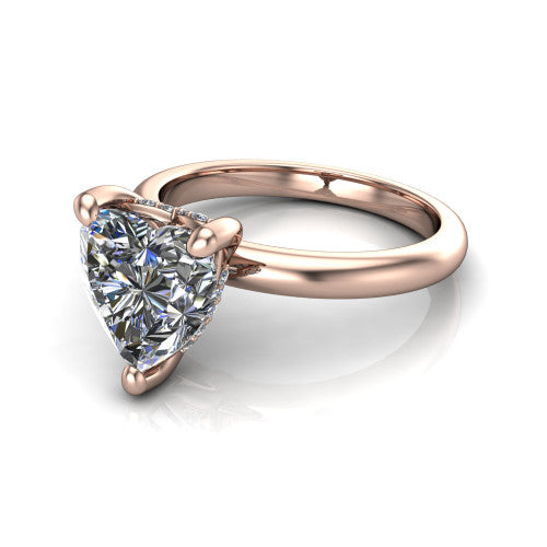 Ariel heart classic engagement ring in 14K Rose Gold, three-quarter perspective showing the solitaire center diamond raised in four prongs above a slim polished band