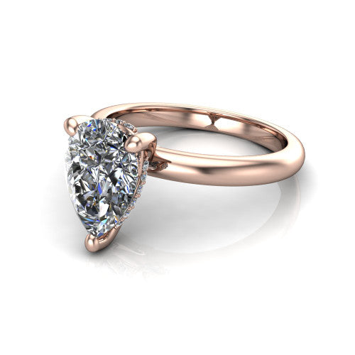 Ariel pear classic engagement ring in 18K Rose Gold, three-quarter perspective showing the solitaire center diamond raised in four prongs above a slim polished band