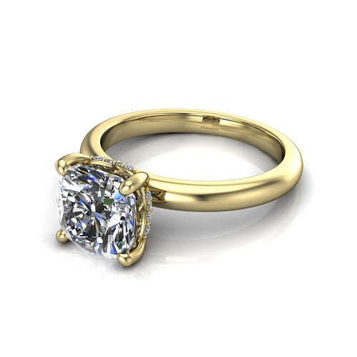 Ariel cushion classic engagement ring in 18K Yellow Gold, three-quarter perspective showing the solitaire center diamond raised in four prongs above a slim polished band