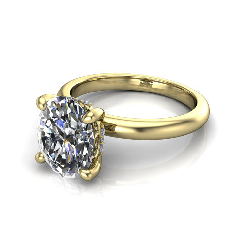 Ariel oval classic engagement ring in 18K Yellow Gold, three-quarter perspective showing the solitaire center diamond raised in four prongs above a slim polished band