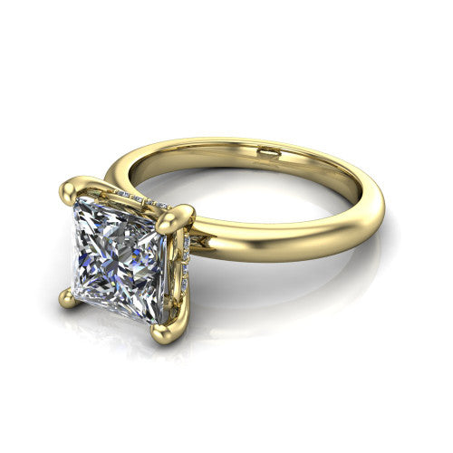 Ariel princess classic engagement ring in 18K Yellow Gold, three-quarter perspective showing the solitaire center diamond raised in four prongs above a slim polished band