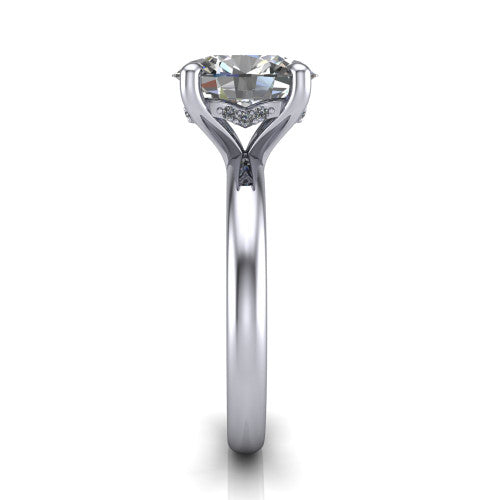 Ariel oval classic engagement ring in 18K White Gold, side profile showing the hidden halo under the head and the slim polished band