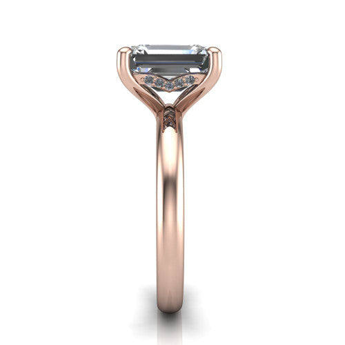 Ariel emerald classic engagement ring in 14K Rose Gold, side profile showing the hidden halo under the head and the slim polished band
