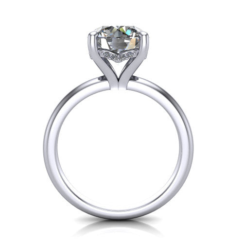 Ariel round classic engagement ring in 18K White Gold, through-finger front profile showing the hidden halo of accent diamonds tucked beneath the center basket