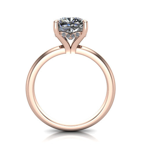 Ariel cushion classic engagement ring in 18K Rose Gold, through-finger front profile showing the hidden halo of accent diamonds tucked beneath the center basket