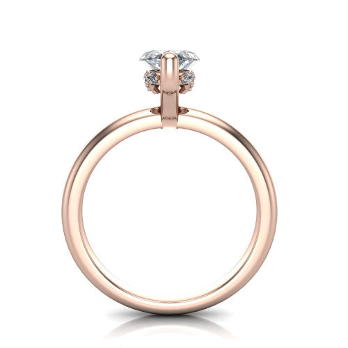 Ariel marquise classic engagement ring in 18K Rose Gold, through-finger front profile showing the hidden halo of accent diamonds tucked beneath the center basket