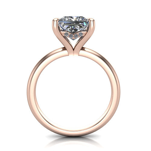 Ariel princess classic engagement ring in 14K Rose Gold, through-finger front profile showing the hidden halo of accent diamonds tucked beneath the center basket