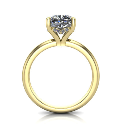 Ariel cushion classic engagement ring in 14K Yellow Gold, through-finger front profile showing the hidden halo of accent diamonds tucked beneath the center basket