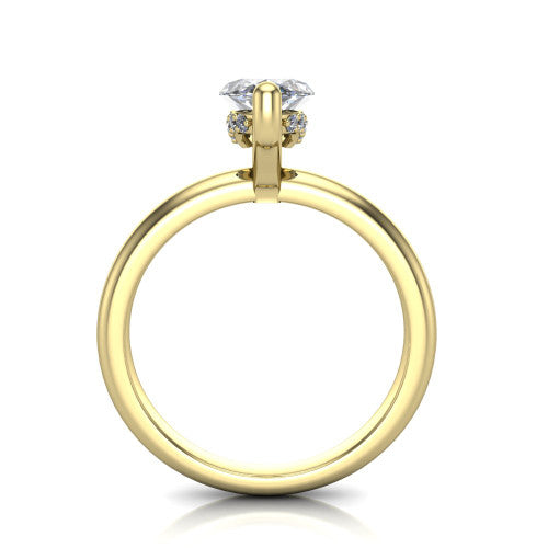 Ariel marquise classic engagement ring in 18K Yellow Gold, through-finger front profile showing the hidden halo of accent diamonds tucked beneath the center basket