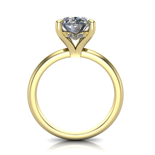 Ariel oval classic engagement ring in 14K Yellow Gold, through-finger front profile showing the hidden halo of accent diamonds tucked beneath the center basket