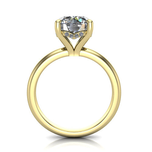 Ariel round classic engagement ring in 18K Yellow Gold, through-finger front profile showing the hidden halo of accent diamonds tucked beneath the center basket
