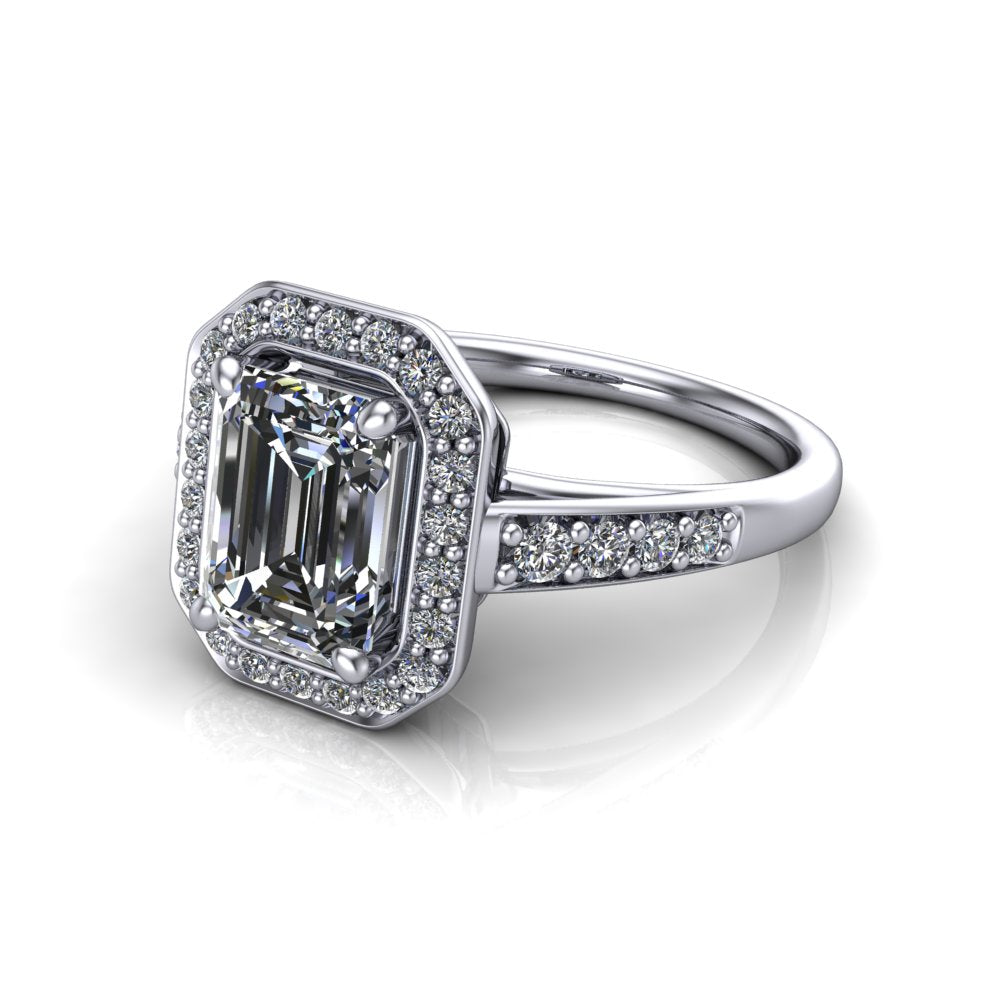 Leia emerald halo engagement ring in 18K White Gold, three-quarter perspective showing the step-cut emerald center diamond, pavé diamond halo, and pavé-set shank