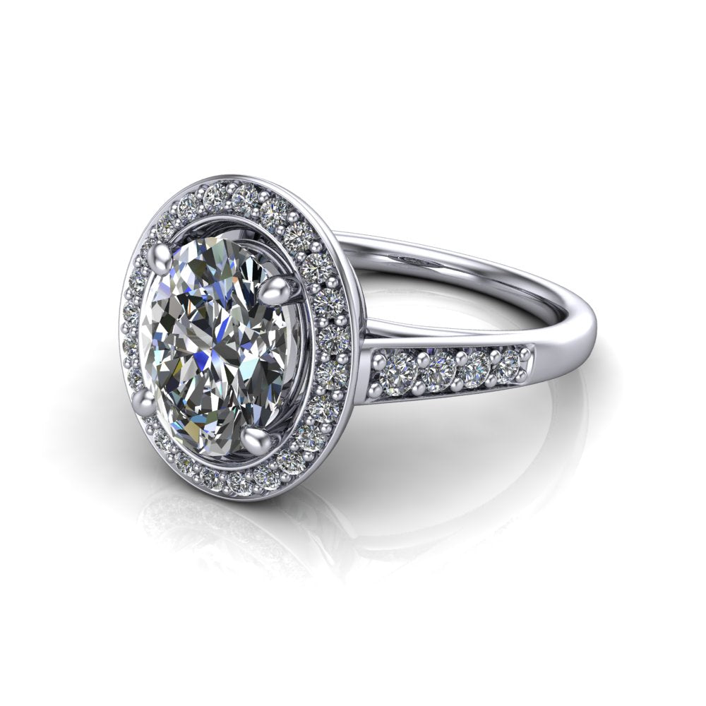 Leia oval halo engagement ring in 18K White Gold, three-quarter perspective showing the brilliant oval-cut center diamond, pavé diamond halo, and pavé-set shank