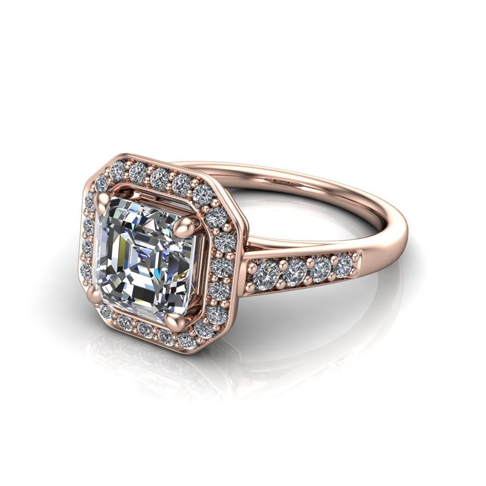 Leia square emerald halo engagement ring in 18K Rose Gold, three-quarter perspective showing the step-cut square emerald center diamond, pavé diamond halo, and pavé-set shank