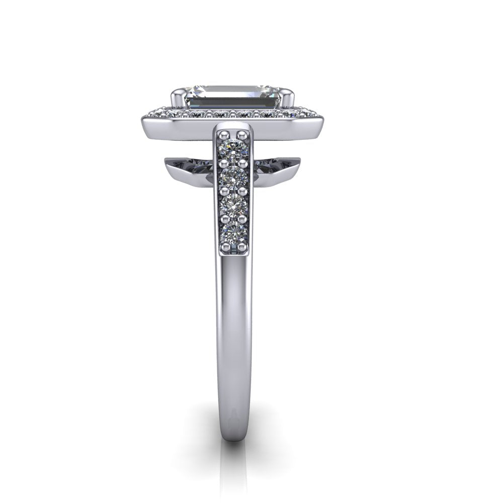 Leia emerald halo engagement ring in Platinum, side profile showing the halo silhouette, cathedral gallery, and pavé-set shank