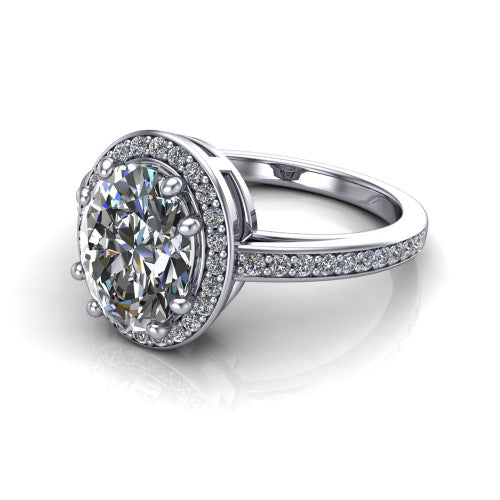 Skye oval halo engagement ring in 18K White Gold, three-quarter perspective showing the haloed center raised above a pav&eacute; shank and pav&eacute;-lined basket