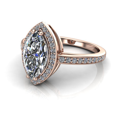 Skye marquise halo engagement ring in 14K Rose Gold, three-quarter perspective showing the haloed center raised above a pav&eacute; shank and pav&eacute;-lined basket