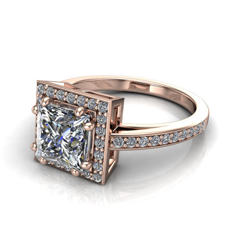 Skye princess halo engagement ring in 14K Rose Gold, three-quarter perspective showing the haloed center raised above a pav&eacute; shank and pav&eacute;-lined basket