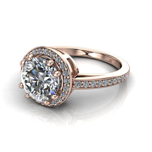 Skye round halo engagement ring in 18K Rose Gold, three-quarter perspective showing the haloed center raised above a pav&eacute; shank and pav&eacute;-lined basket