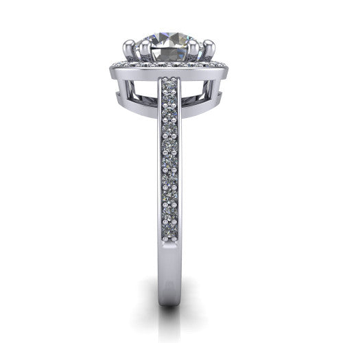 Skye round halo engagement ring in Platinum, side profile showing the pav&eacute;-lined under-basket and the diamonds running down the shank