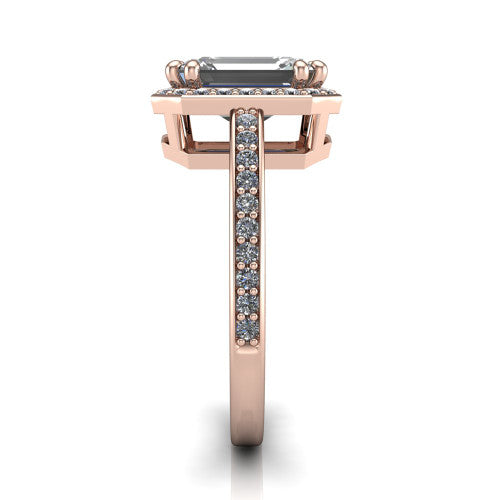 Skye emerald halo engagement ring in 18K Rose Gold, side profile showing the pav&eacute;-lined under-basket and the diamonds running down the shank