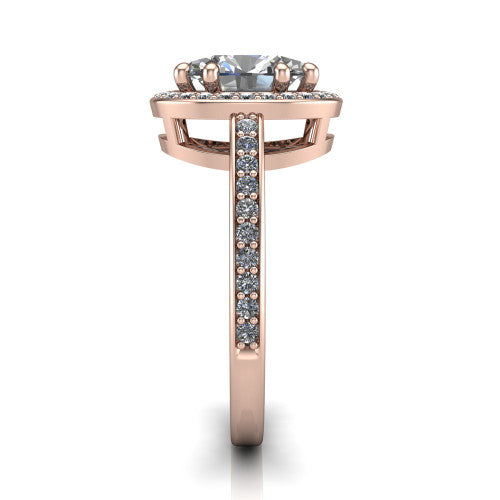 Skye oval halo engagement ring in 18K Rose Gold, side profile showing the pav&eacute;-lined under-basket and the diamonds running down the shank