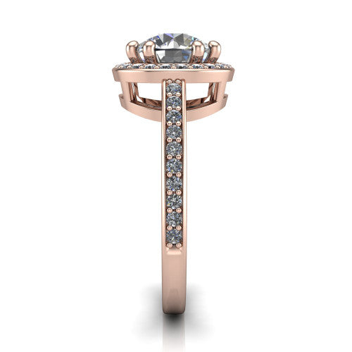 Skye round halo engagement ring in 18K Rose Gold, side profile showing the pav&eacute;-lined under-basket and the diamonds running down the shank