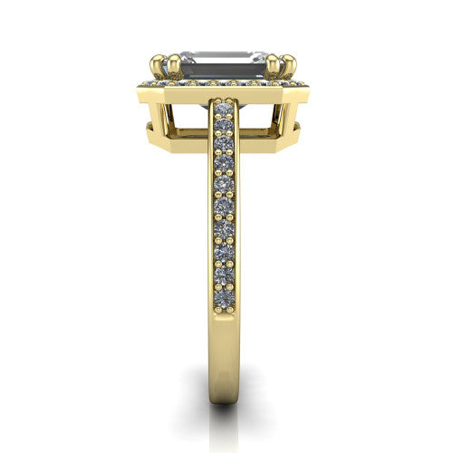 Skye emerald halo engagement ring in 14K Yellow Gold, side profile showing the pav&eacute;-lined under-basket and the diamonds running down the shank