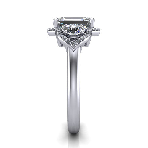 Kalani emerald halo engagement ring in 18K White Gold, side profile showing the open scrollwork bridge and the polished band