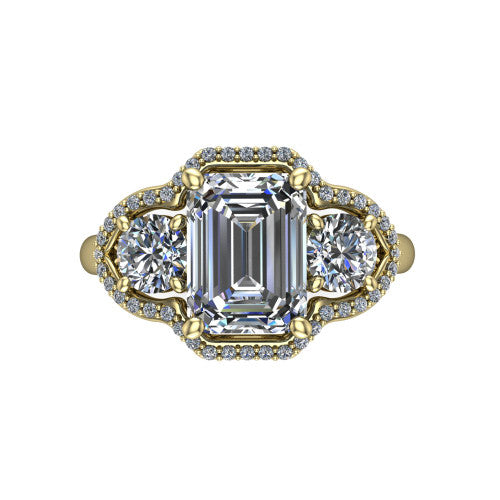 Kalani emerald halo engagement ring in 18K Yellow Gold, top-down view showing the haloed center diamond flanked by two haloed round side stones with filigree bridges between