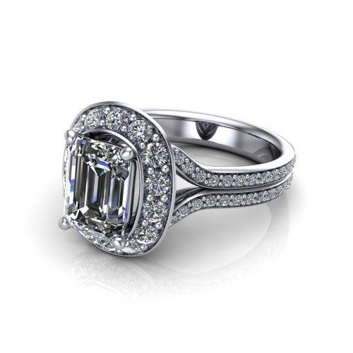 Melissa emerald halo engagement ring in Platinum, three-quarter perspective showing the cushion-shaped halo center raised above a pav&eacute; split shank