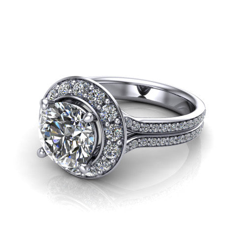 Melissa round halo engagement ring in Platinum, three-quarter perspective showing the cushion-shaped halo center raised above a pav&eacute; split shank