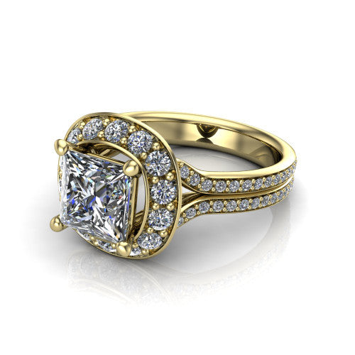 Melissa princess halo engagement ring in 18K Yellow Gold, three-quarter perspective showing the cushion-shaped halo center raised above a pav&eacute; split shank