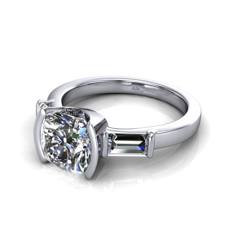 Amanda cushion three stone engagement ring in Platinum, three-quarter perspective showing the center diamond between two tapered baguette side stones on a slim polished band