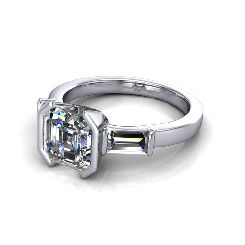 Amanda asscher three stone engagement ring in 14K White Gold, three-quarter perspective showing the center diamond between two tapered baguette side stones on a slim polished band