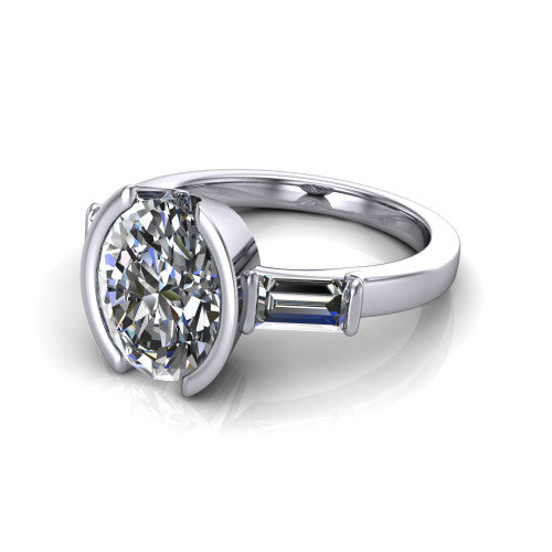 Amanda oval three stone engagement ring in 18K White Gold, three-quarter perspective showing the center diamond between two tapered baguette side stones on a slim polished band