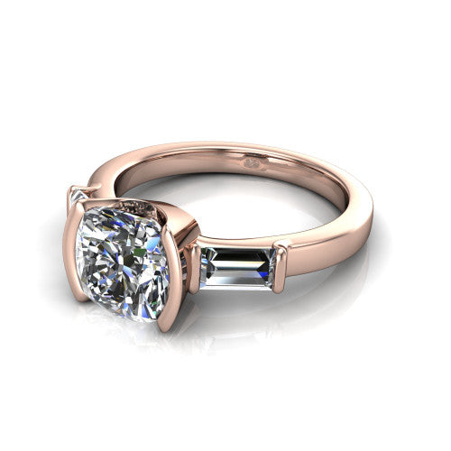 Amanda cushion three stone engagement ring in 14K Rose Gold, three-quarter perspective showing the center diamond between two tapered baguette side stones on a slim polished band