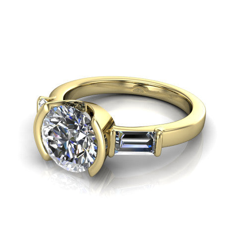 Amanda round three stone engagement ring in 18K Yellow Gold, three-quarter perspective showing the center diamond between two tapered baguette side stones on a slim polished band