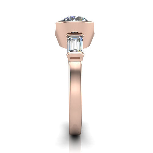 Amanda round three stone engagement ring in 18K Rose Gold, side profile showing the tapered baguette side stone and the smooth tapered polished band