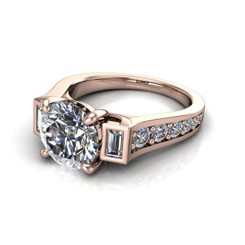 Estella round three stone engagement ring in 14K Rose Gold, three-quarter perspective showing the center diamond between two tapered baguette side stones above a pav&eacute; band