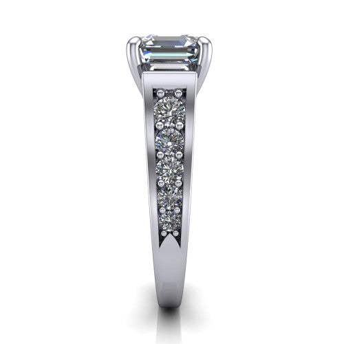 Estella asscher three stone engagement ring in 14K White Gold, side profile showing the tapered baguette side stone and the round diamonds running down the shank