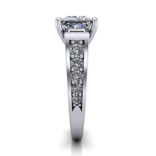 Estella princess three stone engagement ring in 14K White Gold, side profile showing the tapered baguette side stone and the round diamonds running down the shank