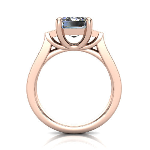 Estella emerald three stone engagement ring in 18K Rose Gold, through-finger front profile showing the three-stone head raised above the pav&eacute; band