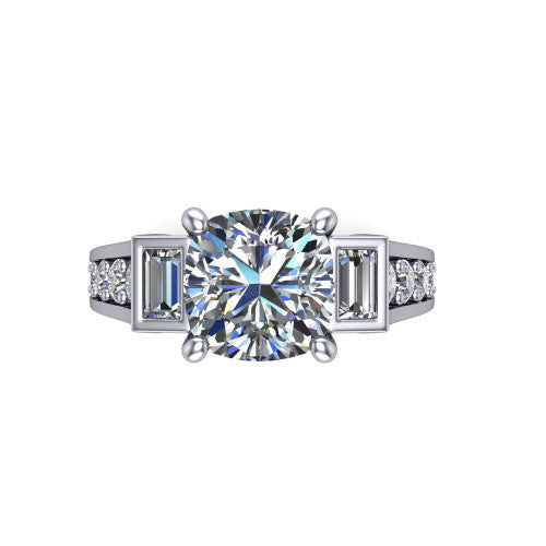 Estella cushion three stone engagement ring in Platinum, top-down view showing the center diamond flanked by two tapered baguette side stones over a diamond-set shank