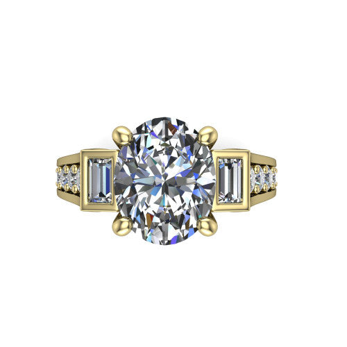 Estella oval three stone engagement ring in 18K Yellow Gold, top-down view showing the center diamond flanked by two tapered baguette side stones over a diamond-set shank