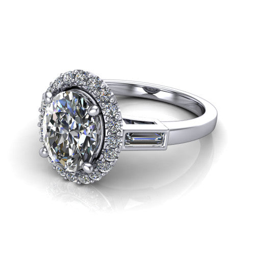 Lorelai oval halo engagement ring in 14K White Gold, three-quarter perspective showing the haloed center between two tapered baguette side stones on a slim polished band